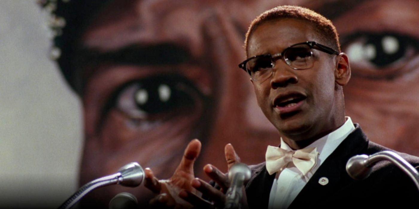 Denzel Washington as Malcolm X in Malcolm X giving a speech Warner Bros