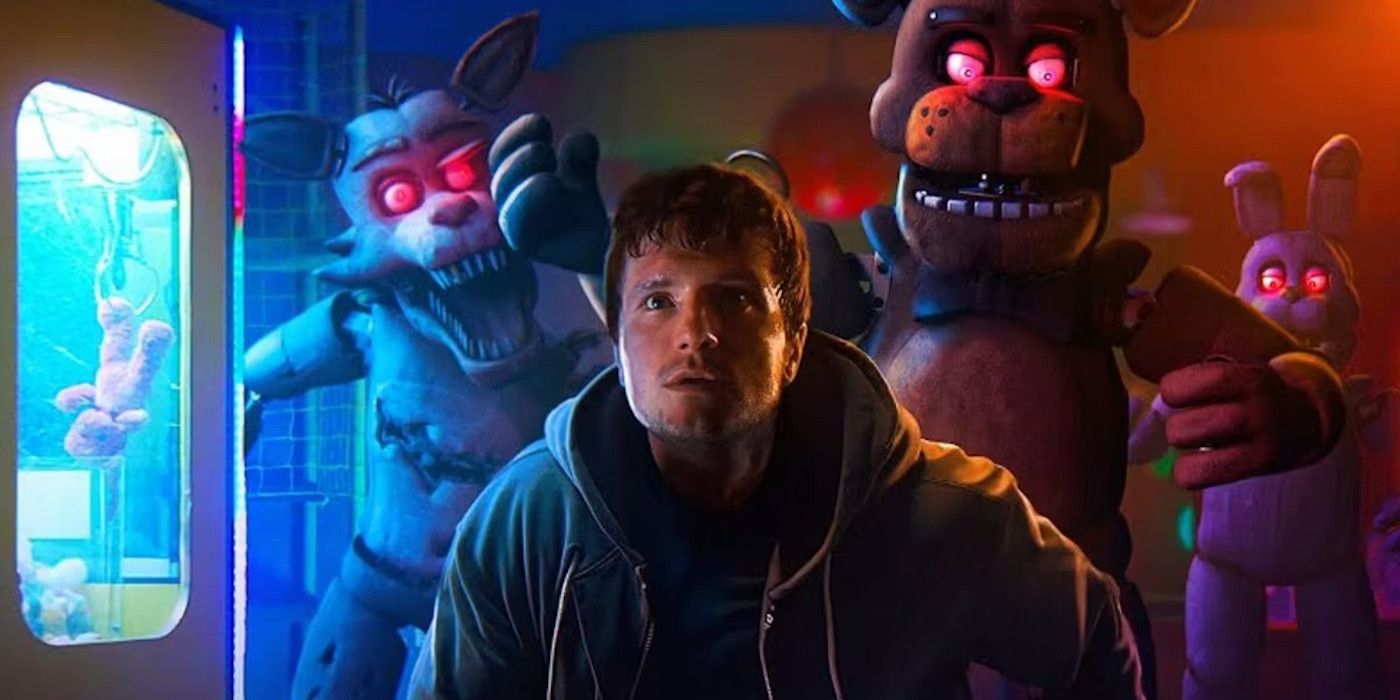 Josh Hutcherson as Mike Schmidt in Five Nights at Freddy's running away from the animatronics