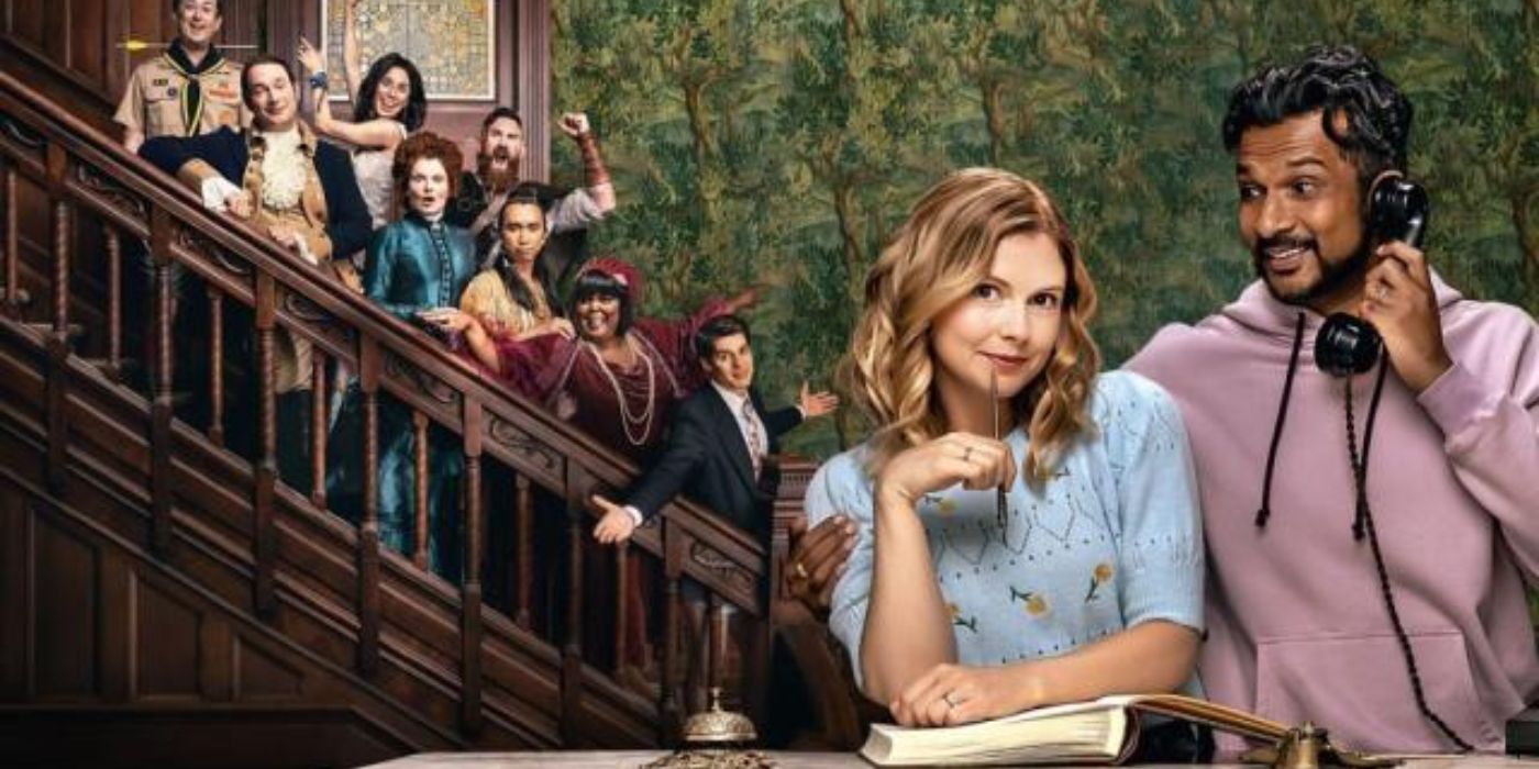 Rose McIver as Samantha and Utkarsh Ambudkar as Jay with the main cast of Ghosts standing on the stairs behind them