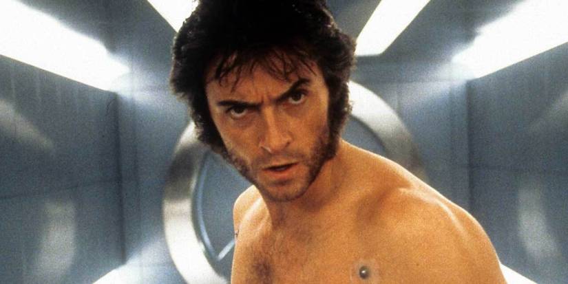 Hugh Jackman as Wolverine looking towards the camera in X-Men (2000)