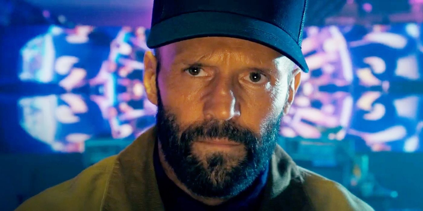 Jason Statham with a beard and hat in The Beekeeper