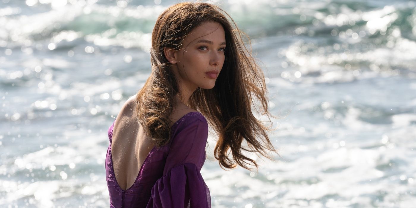Jessica Alexander as Vanessa, standing by the ocean as the wind blows through her hair, in The Little Mermaid