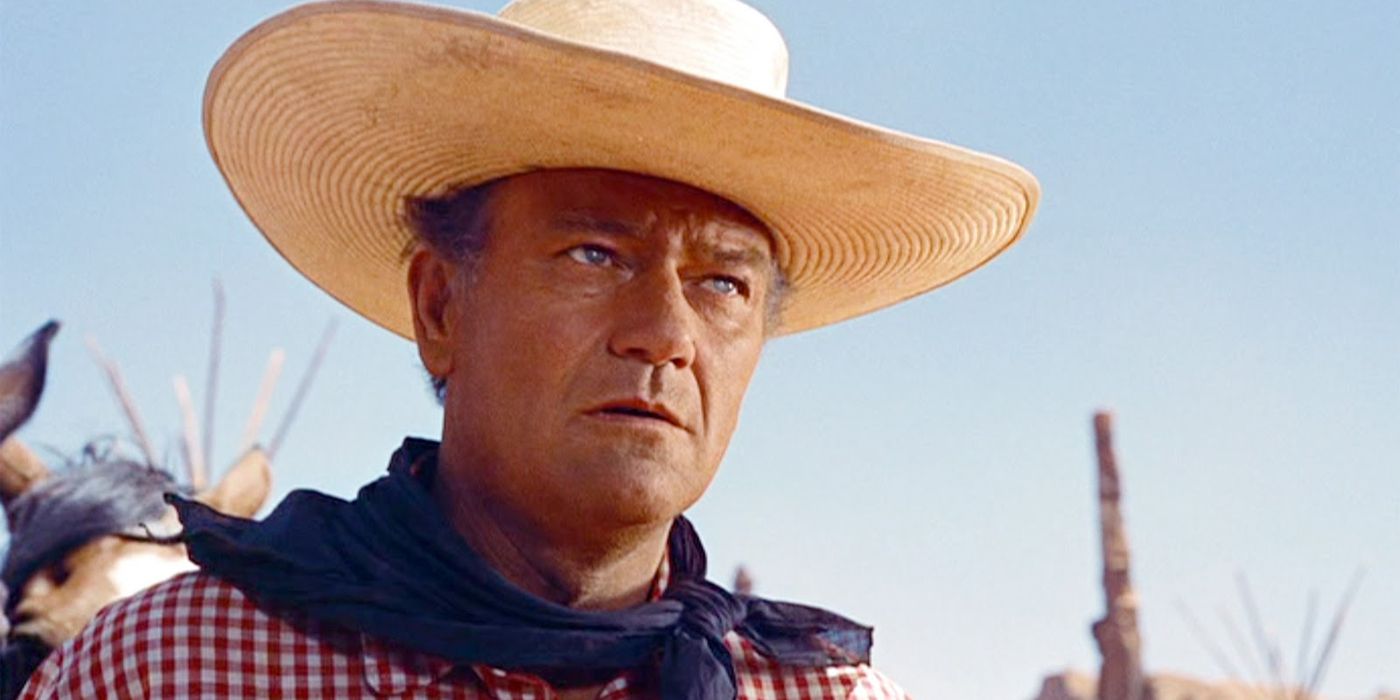 John Wayne as Ethan Edwards wearing red, white, and blue in The Searchers