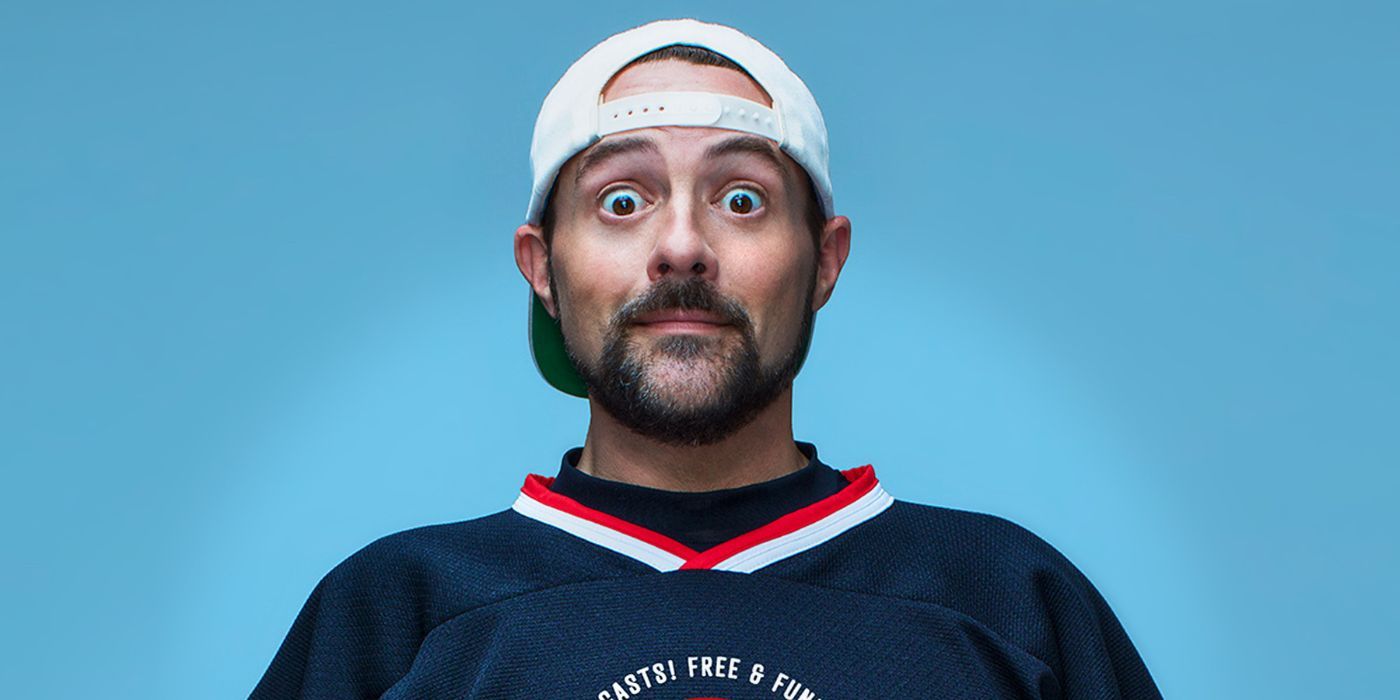Kevin Smith wearing a white cap backwards