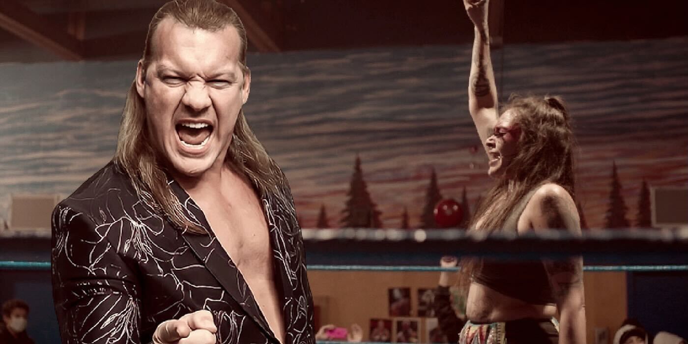 Chris Jericho and a female wrestler with her fist in the air