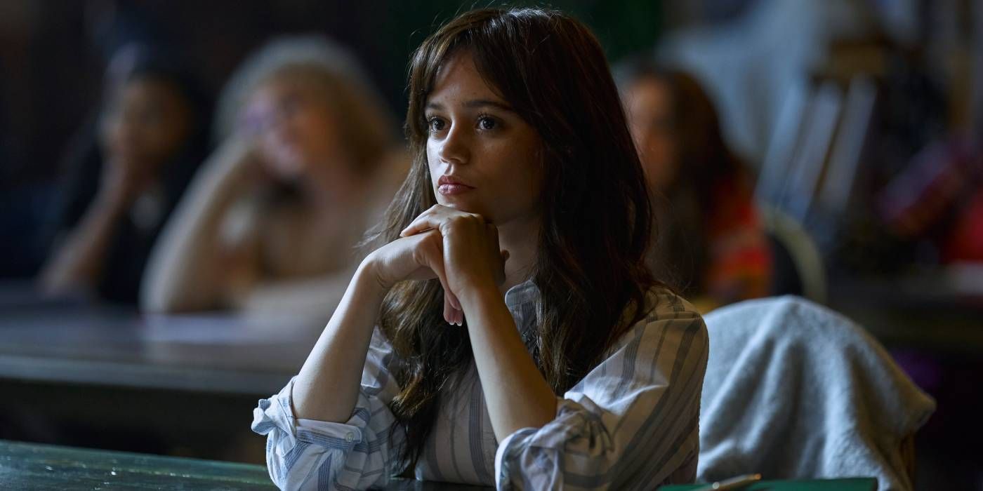 Jenna Ortega in Miller's Girl (2024) sitting at a school desk in class