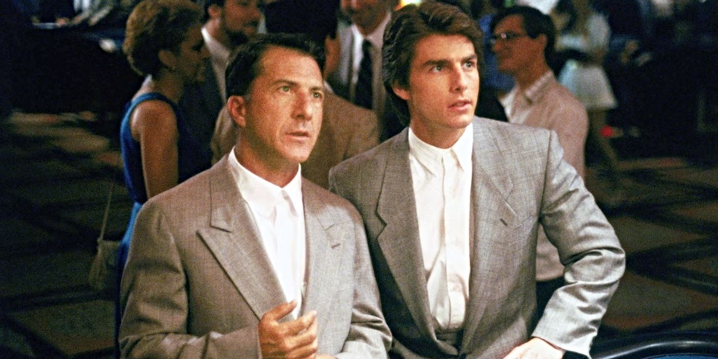 Rain Man Raymond and Charlie stand together at a table in a casino