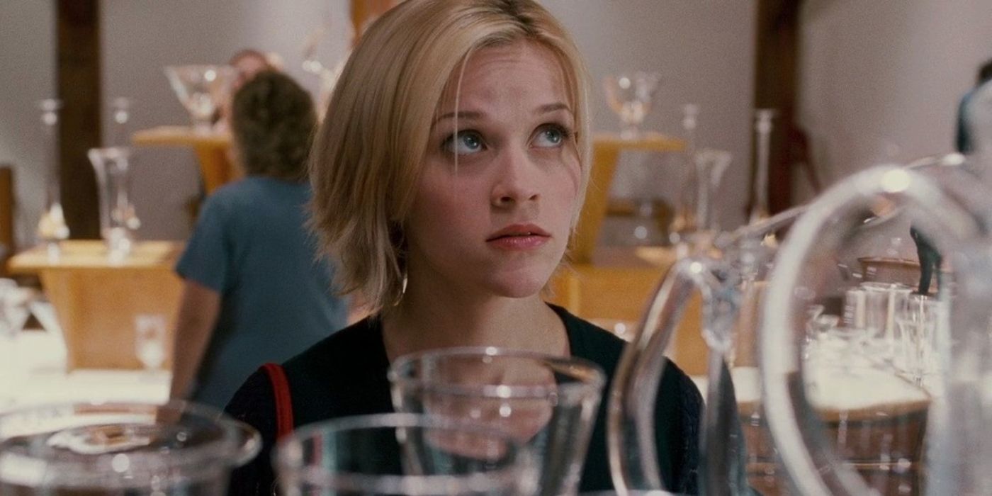 Reese Witherspoon in Sweet Home Alabama looking at glassware