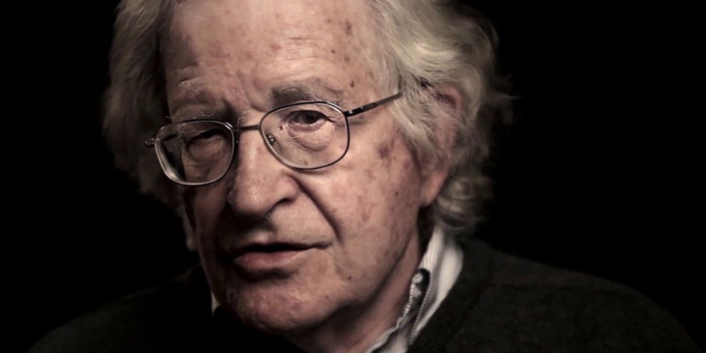 Noam Chomsky looks at the camera in Requiem for the American Dream (2015).