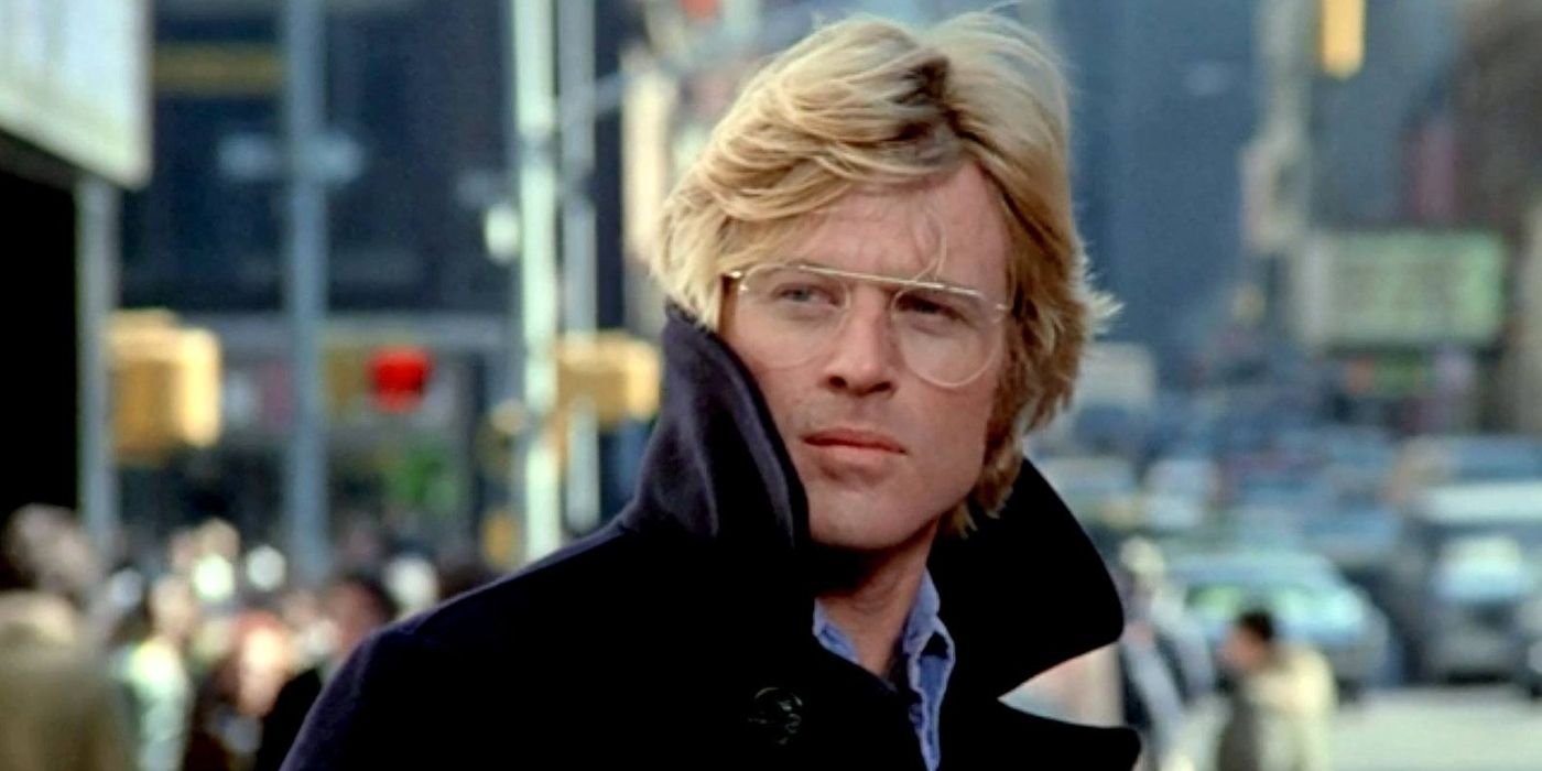 A close-up of Robert Redford as Joseph Turner in a navy peacoat with the collar turned up in in Three Days of the Condor (1975)