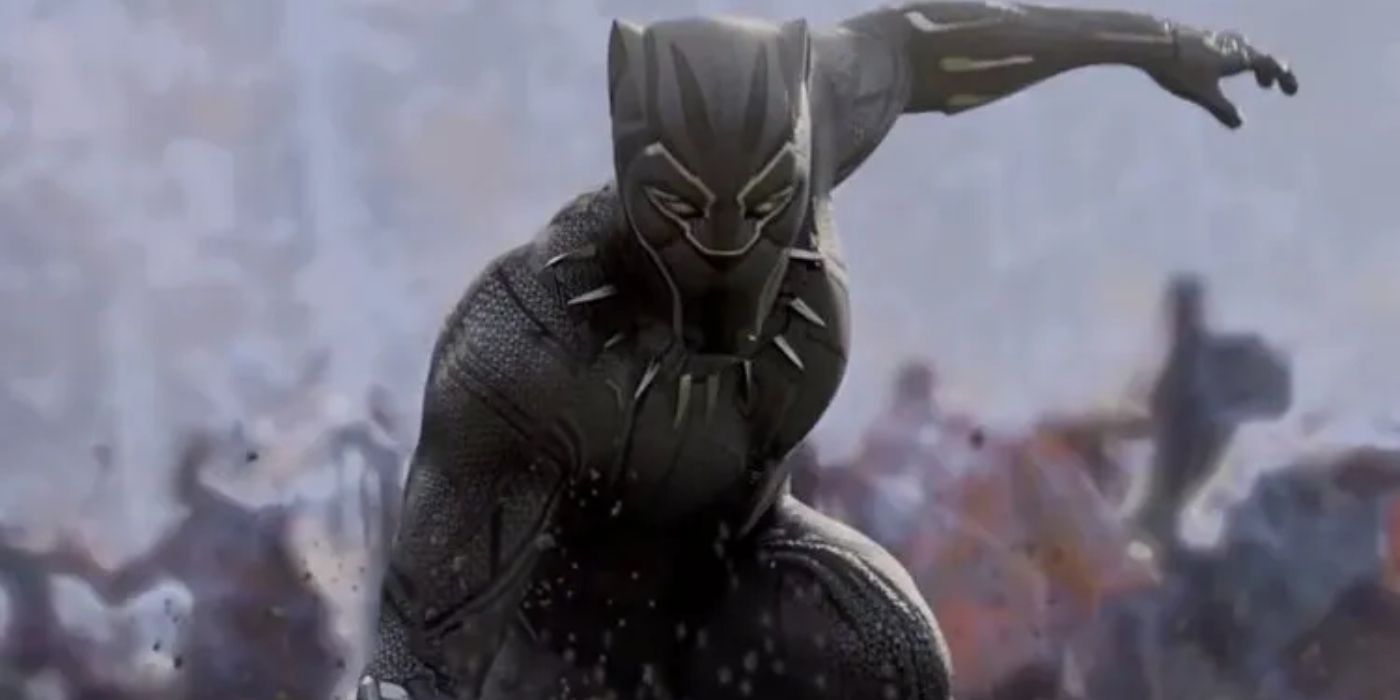 Chadwick Boseman as Black Panther with his arm raised in Black Panther