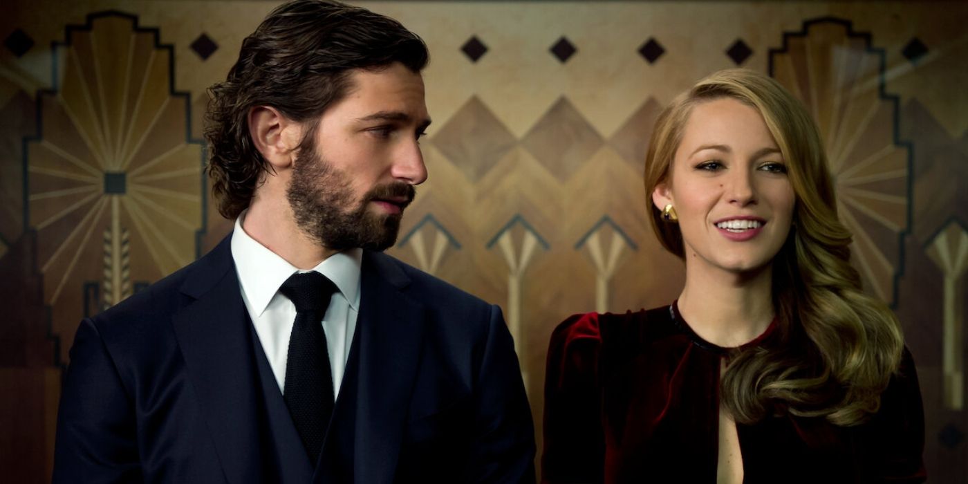 Michiel Huisman as Ellis Jones standing next to Blake Lively's Adaline in an art deco style elevator in The Age of Adaline