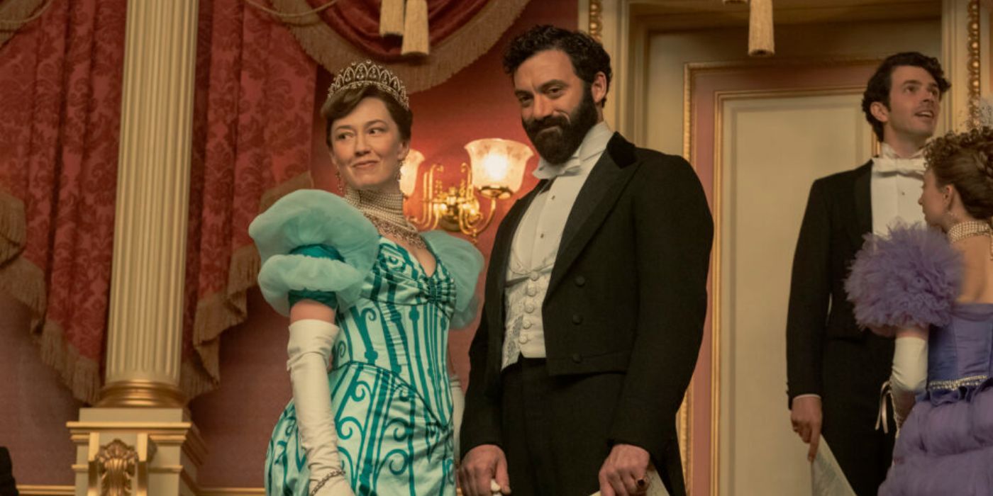 Carrie Coon and Morgan Specter as Bertha and George Russell, dressed in formal attire in The Gilded Age