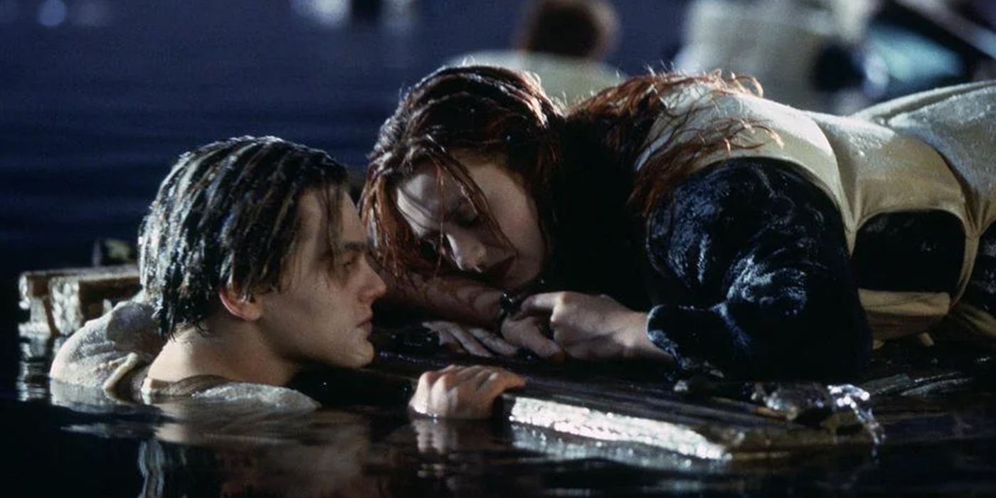 Rose lies on a broken door, while Jack floats in the water beside her