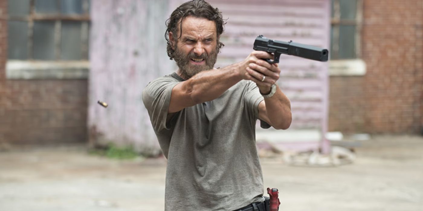 Rick aims a gun in The Walking Dead
