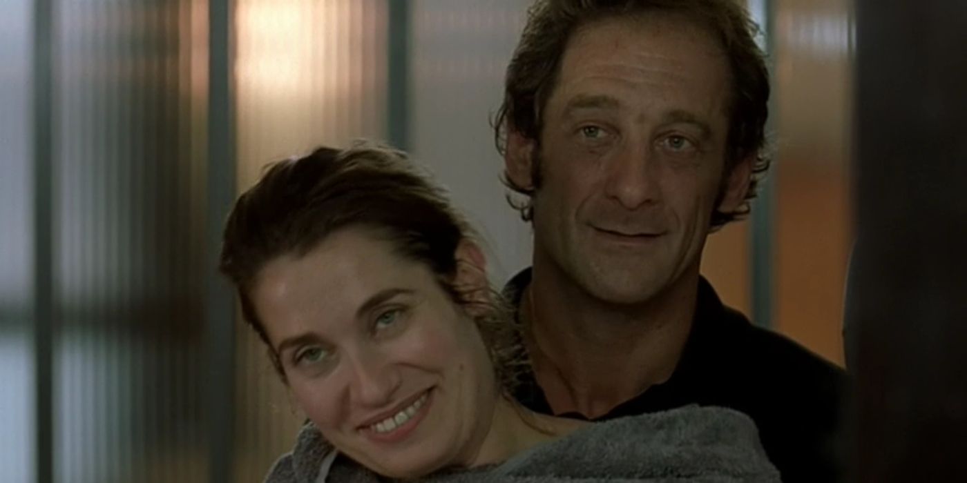 Vincent Lindon as Marc Thiriez and Emmanuelle Devos as Agnes in La Moustache