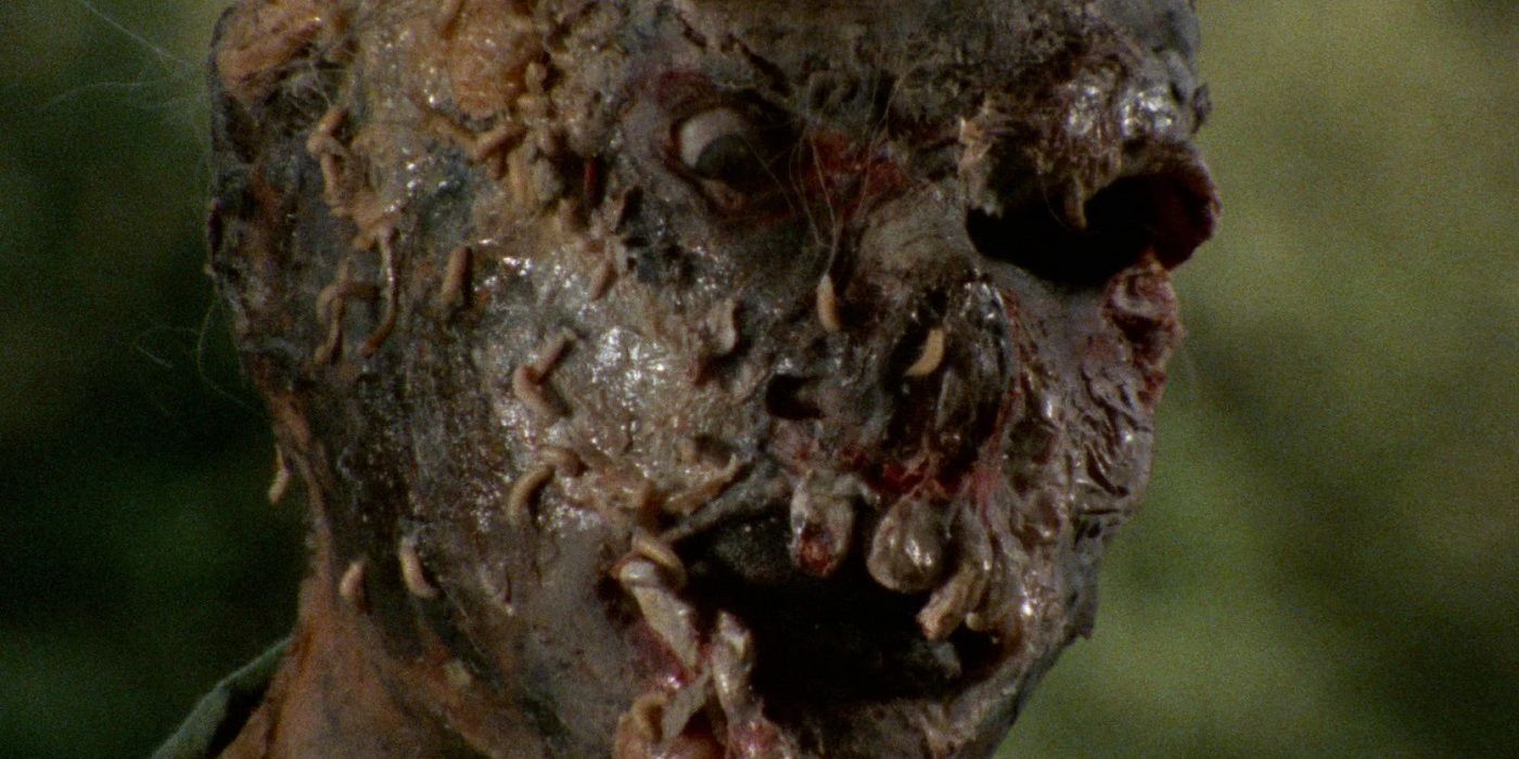 A decayed zombie risen from the ground in the Italian walking dead giallo, Burial Ground