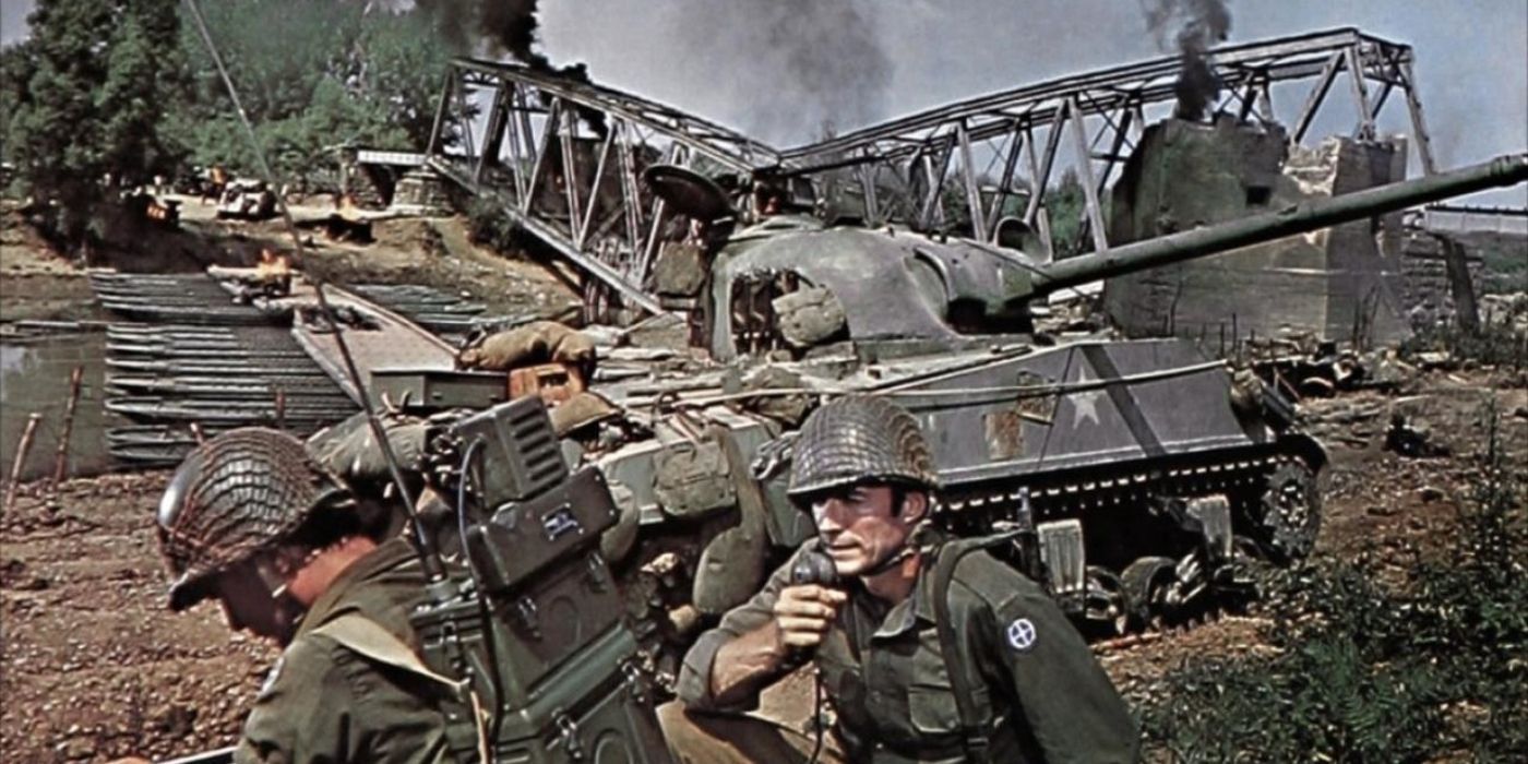 Soldiers on guard in Kelly's Heroes with a tank behind them