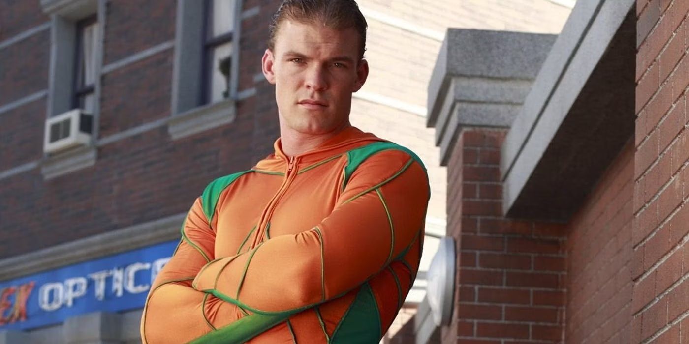Alan Ritchson in orange suit as Aquaman in Smallville
