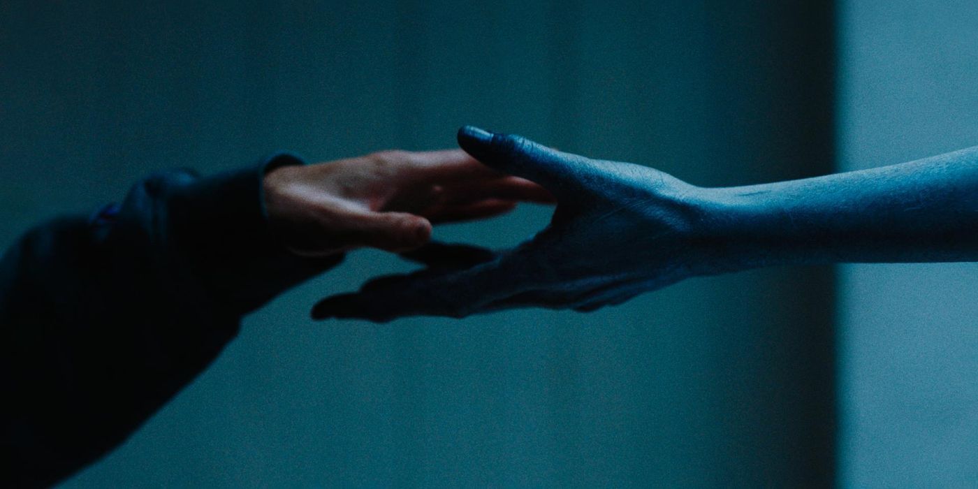 Demon hand and woman's hand touch in SXSW movie Family 2024