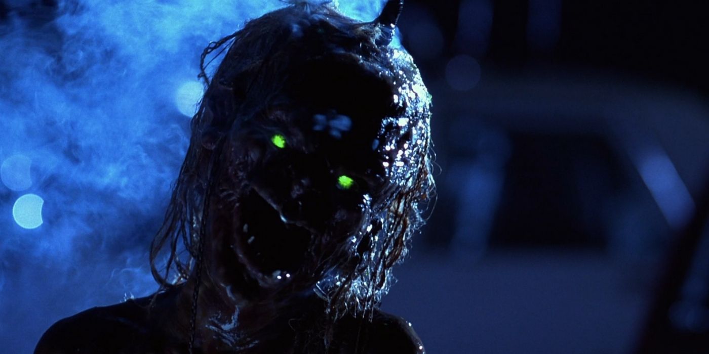 A medium close-up of a demon with glowing green eyes