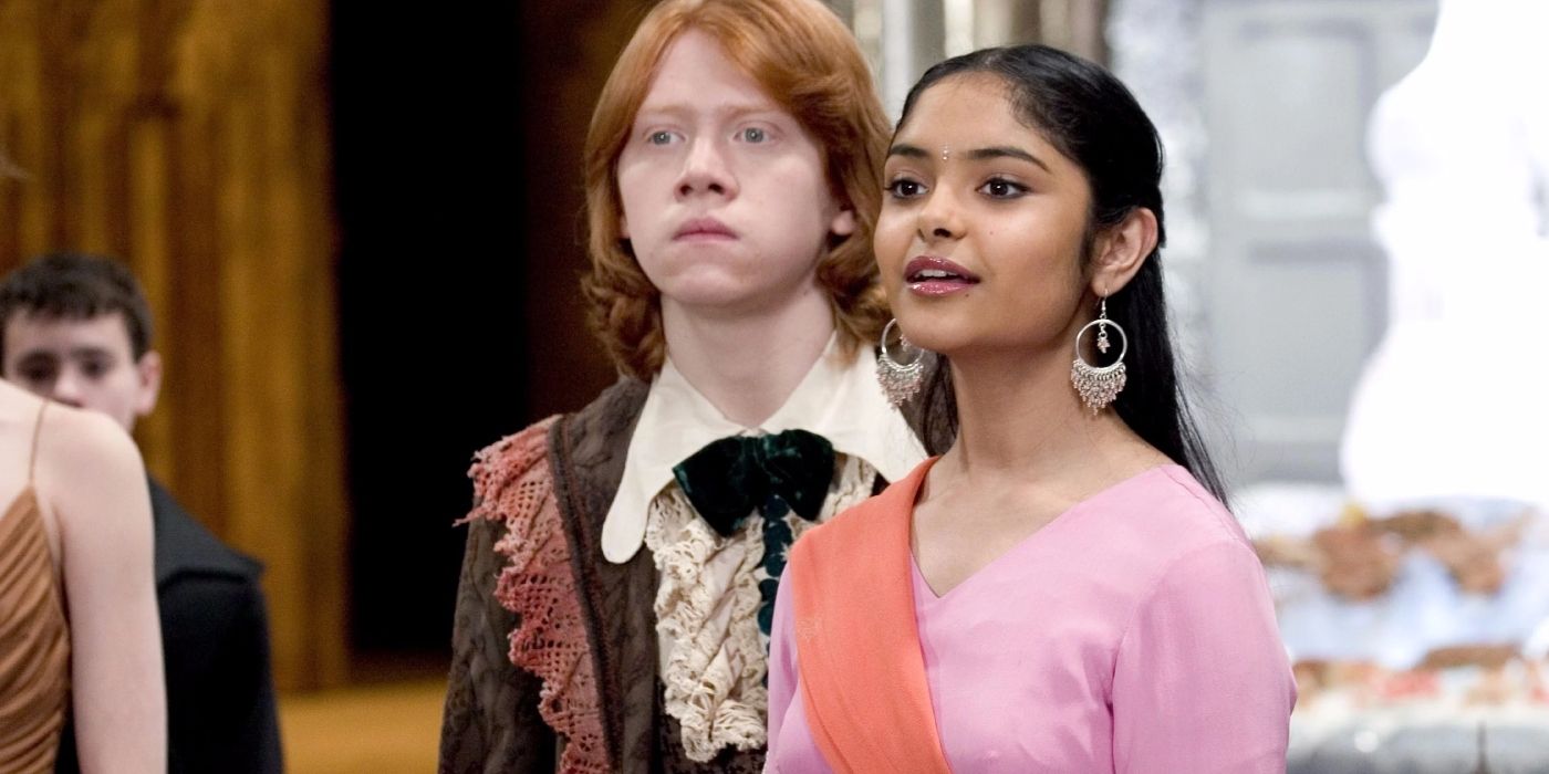 Rupert Grint as Ron and Afshan Afzad wearing a pink dress in Harry Potter and the Goblet of Fire