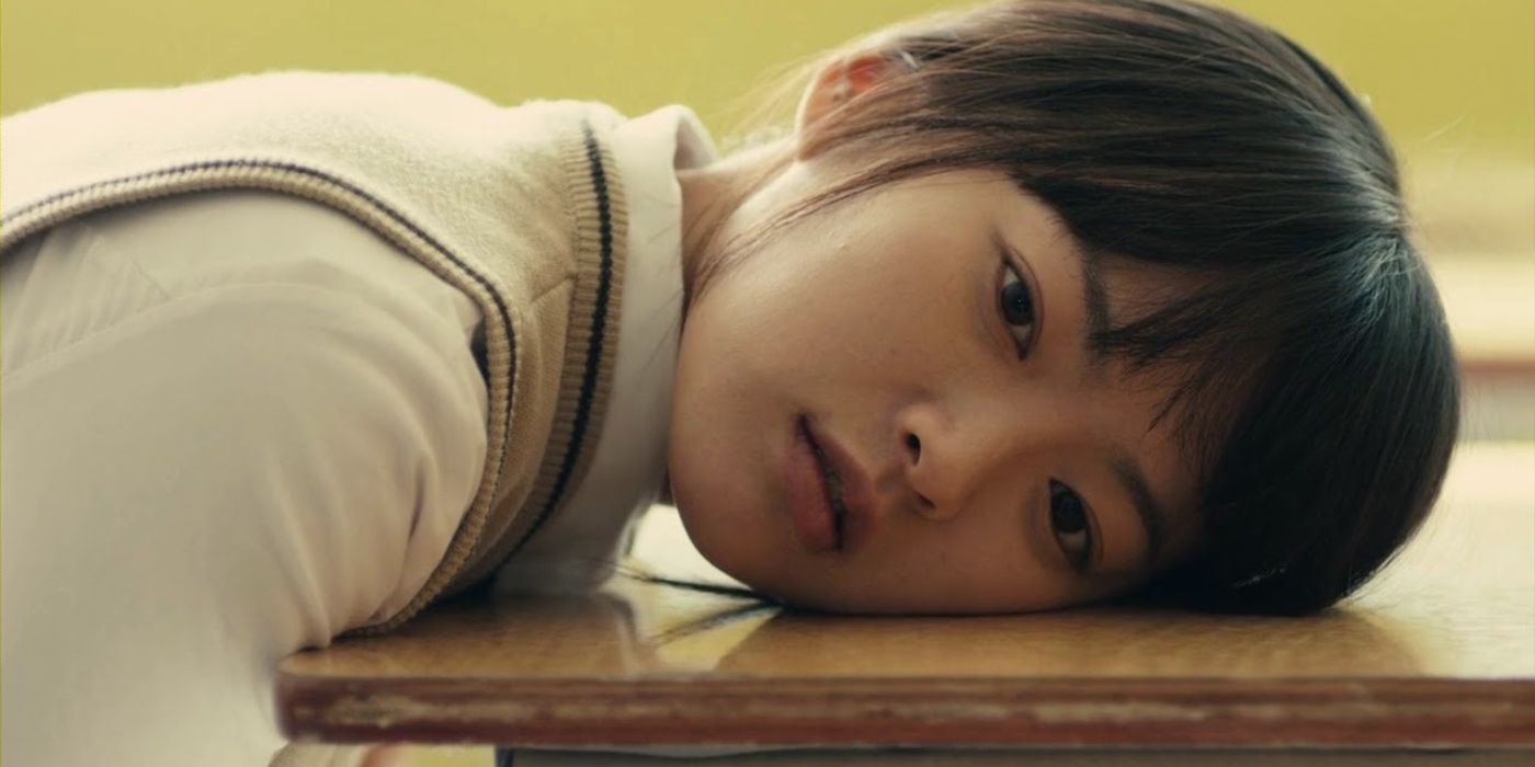 Han Gong-ju -- main character lays with her cheek on a school desk 