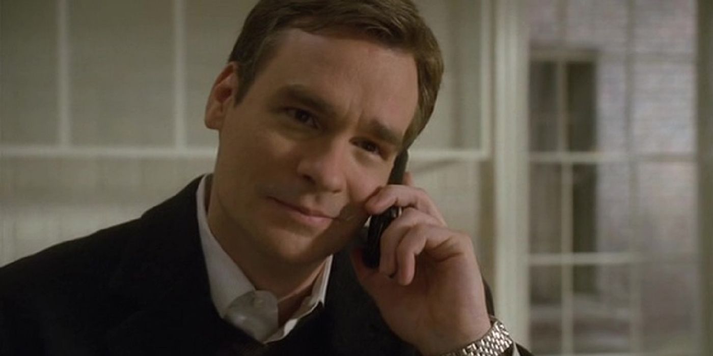 Robert Sean Leonard as Dr. Wilson answering a phone call in House, M.D.