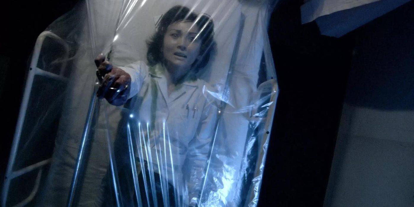 Yôko Maki as a nurse wrapped in a plastic sheet in Infection (2004)