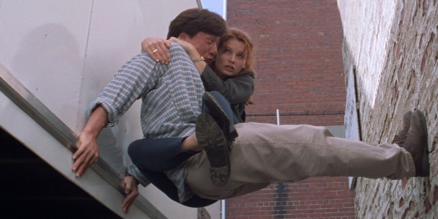 Jackie Chan as Jackie and Gabrielle Fitzpatrick as Diana holding themselves against a wall in Mr. Nice Guy