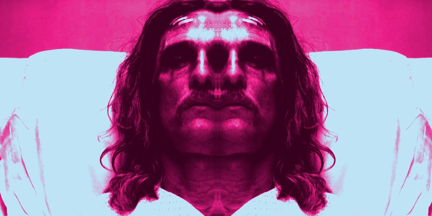 Matthew McConaughey reflected in bed in pink in the finale of True Detective