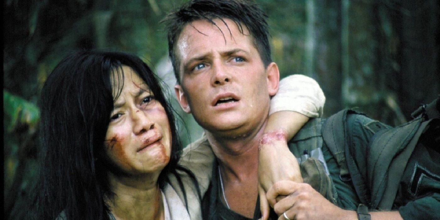 Michael J Fox supporting a Vietnamese woman in Casualties of War