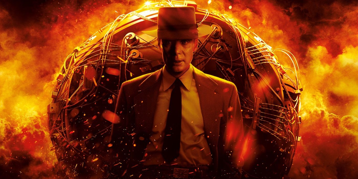Cillian Murphy as Oppenheimer in front of a large atomic bomb device in Oppenheimer