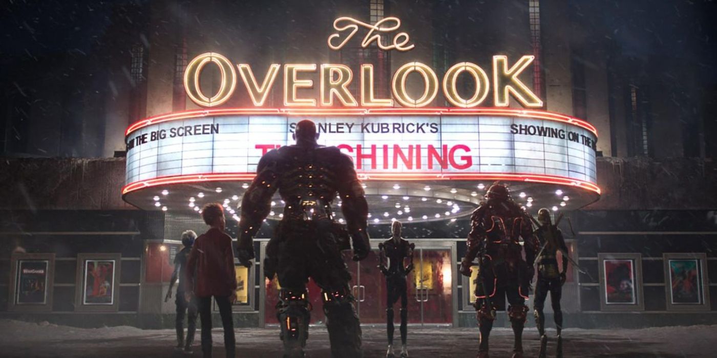 the group of players stands in front of a movie theater that's showing stanley kubrick's The Shiningin a scene from ready player one