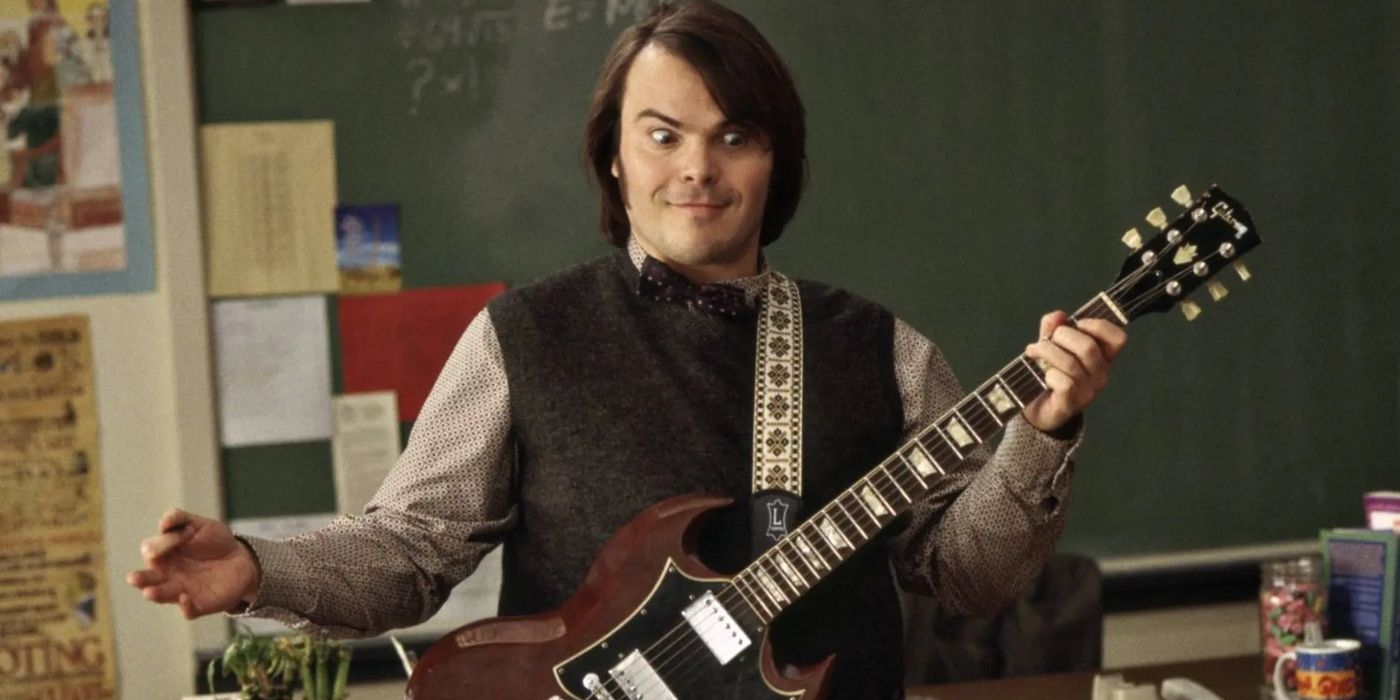 jack black holds a guitar in the film school of rock