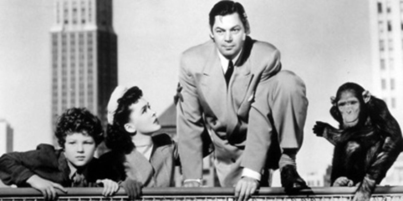 Tarzan, Jane, Boy e um chimpanzé no topo de um prédio nas aventuras de Tarzan em Nova York