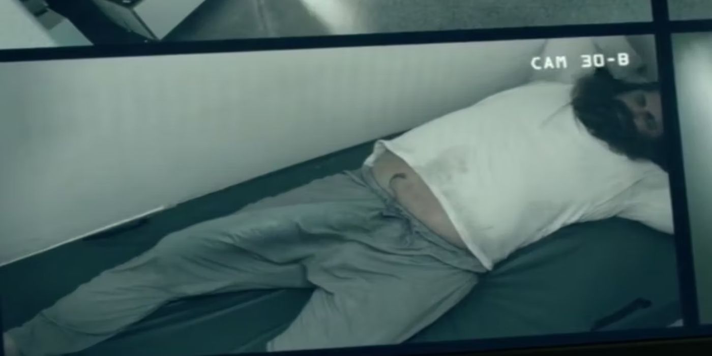 Love Sausage unconscious in a cell