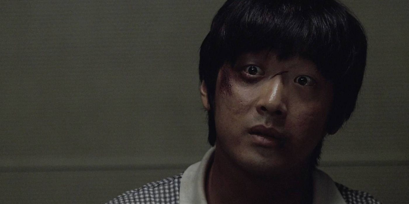 Un prim-plan al lui Ha Jung-woo ca Jee Young-min, cu un ochi negru