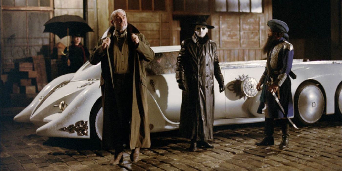 Sean Connery as Allan Quatermain and a pair of superheroes standing beside a car in The League of Extraordinary Gentlemen