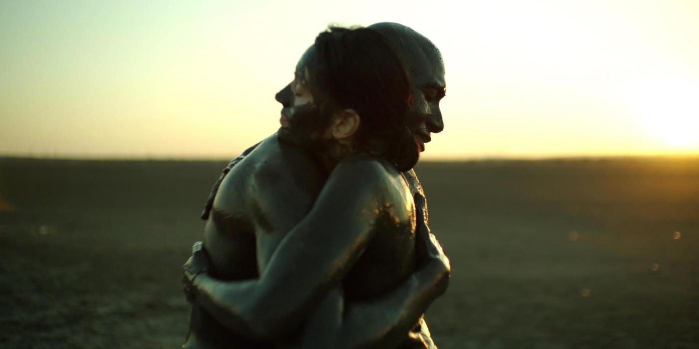 Two people hug in The Black Sea movie from SXSW