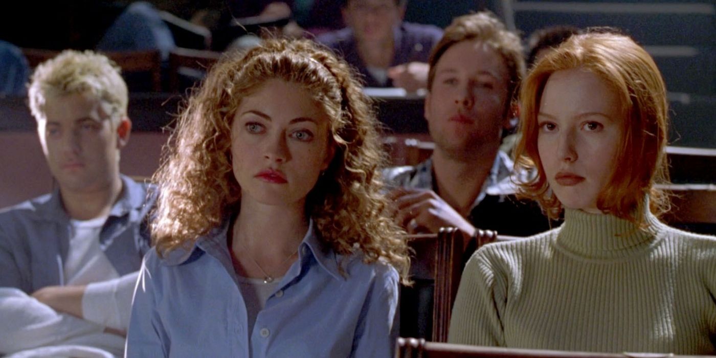Rebecca Gayheart as Nurse Brenda sits in a college auditorium with other students