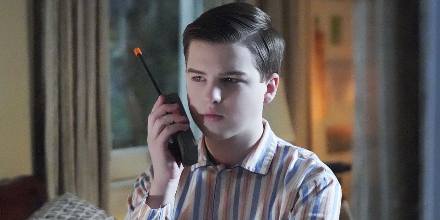 Iain Armitage as Sheldon holding a walkie-talkie in Young Sheldon