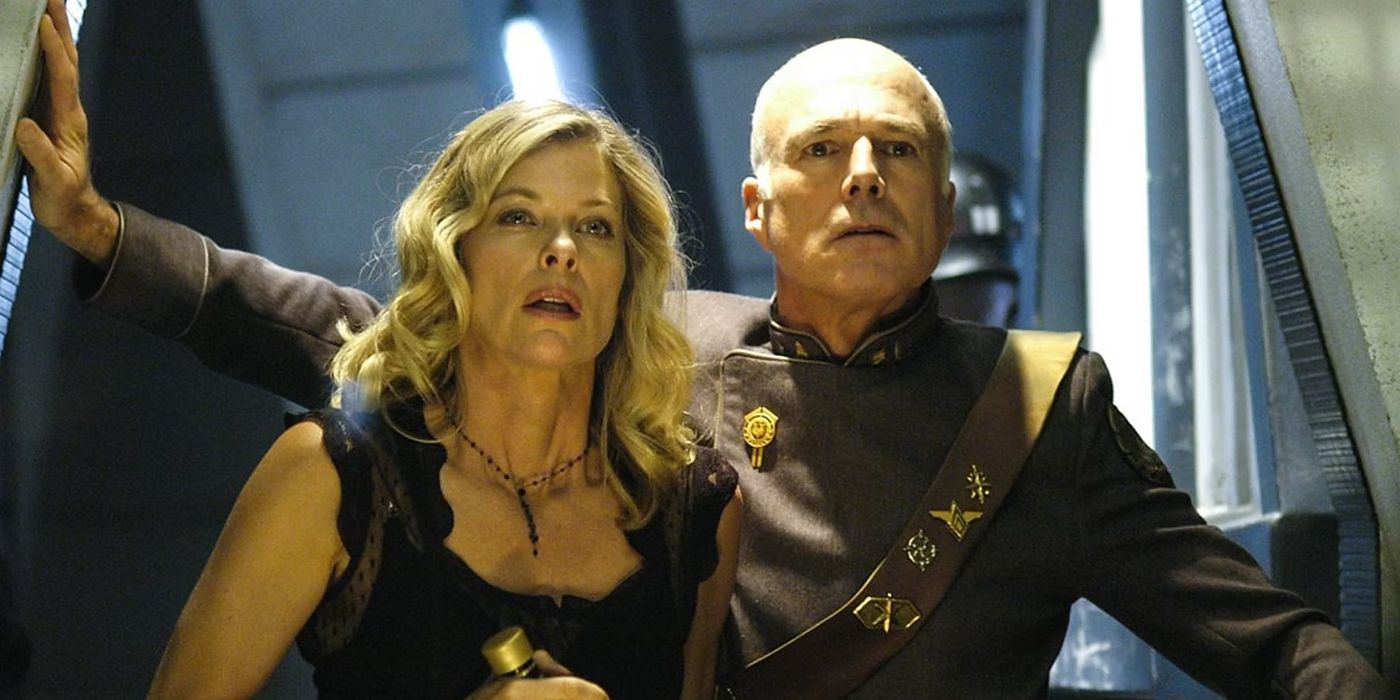 Ellen and Saul stand on the ship in Battlestar Galactica