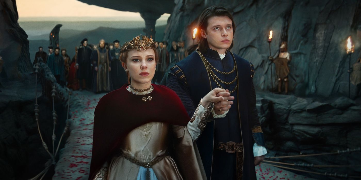 Prince Henry and Elodie at the wedding ceremony in the mountains in a cave in Damsel