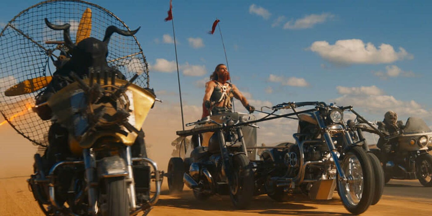 Chris Hemsworth rides a chariot bike.