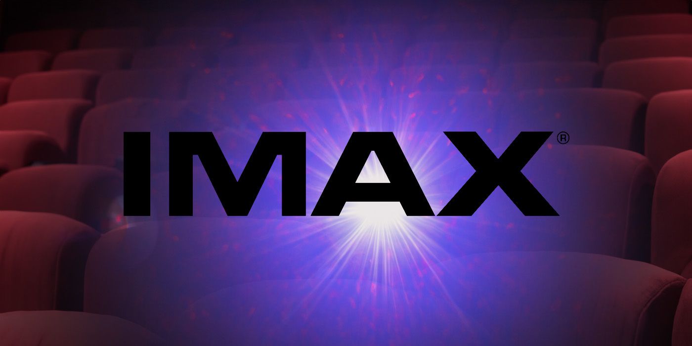 An edited image of the IMAX logo in front of movie theater seats