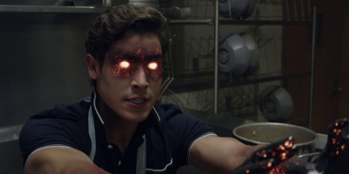 Henrique Zaga as Roberto da Costa with glowing eyes in The New Mutants
