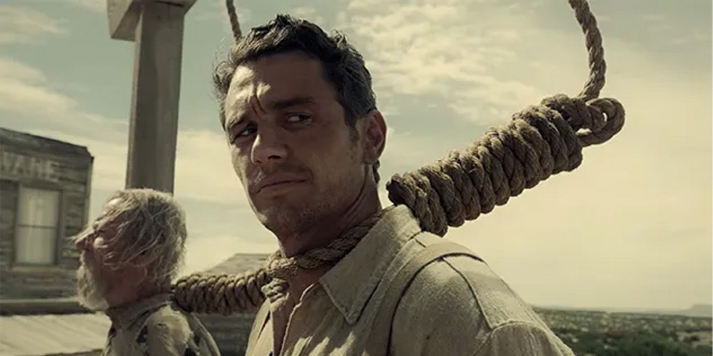 James Franco with a noose around his neck, looking at someone off-screen in The Ballad of Buster Scruggs