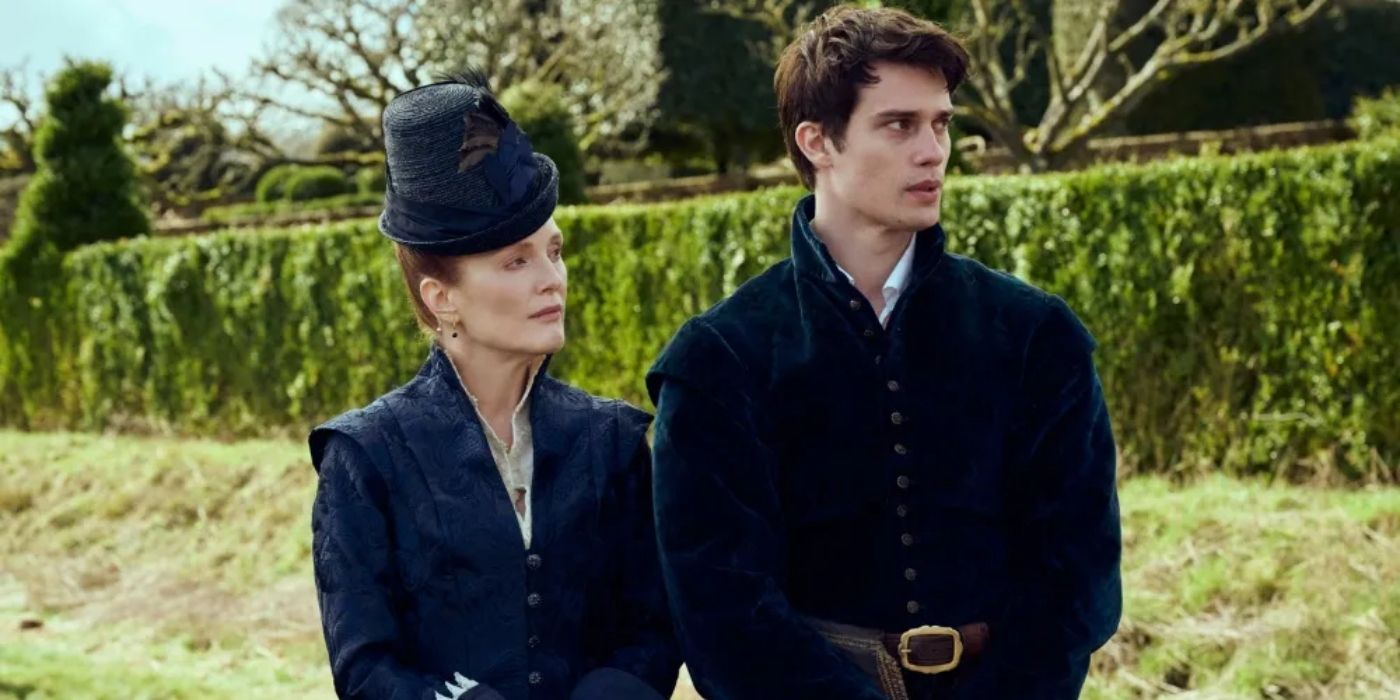 Julianne Moore and Nicholas Galitzine walk in a garden in Mary & George