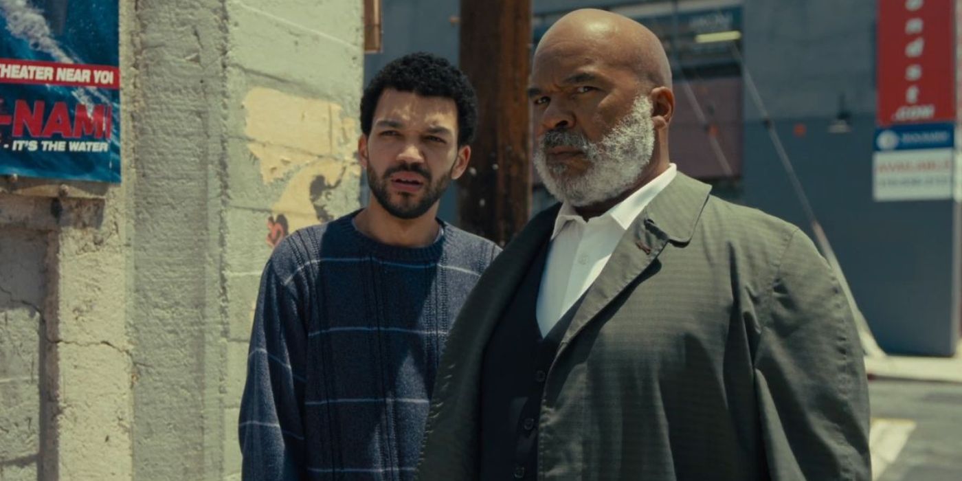 Justice Smith as Aren and David Alan Grier as Roger in The American Society of Magical Negroes
